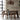 a wooden dining table and chairs in a room with a hanging rattan lampshade and floor to ceiling windows