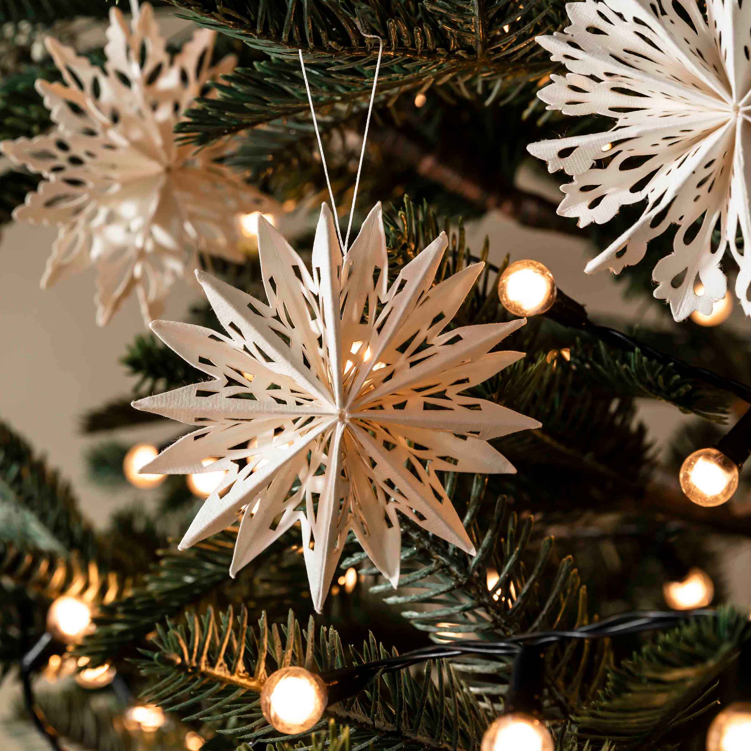 Maddox Cutout Stars – Set of 9 Warm White Paper Decorations
